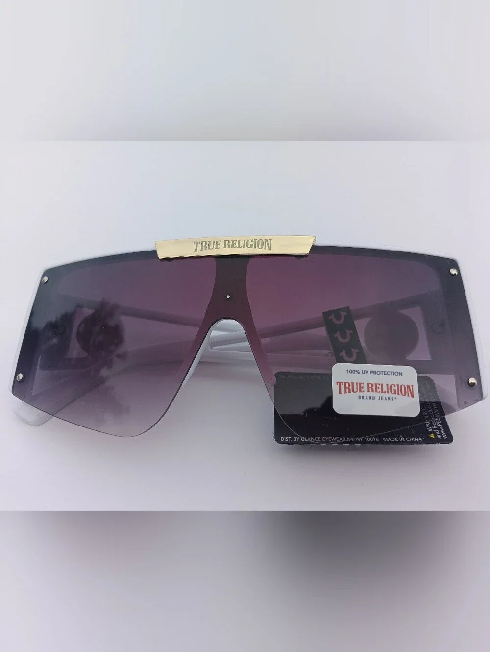 True Religion White Shield Sunglasses with Gold Accent and Purple Gradient Lens